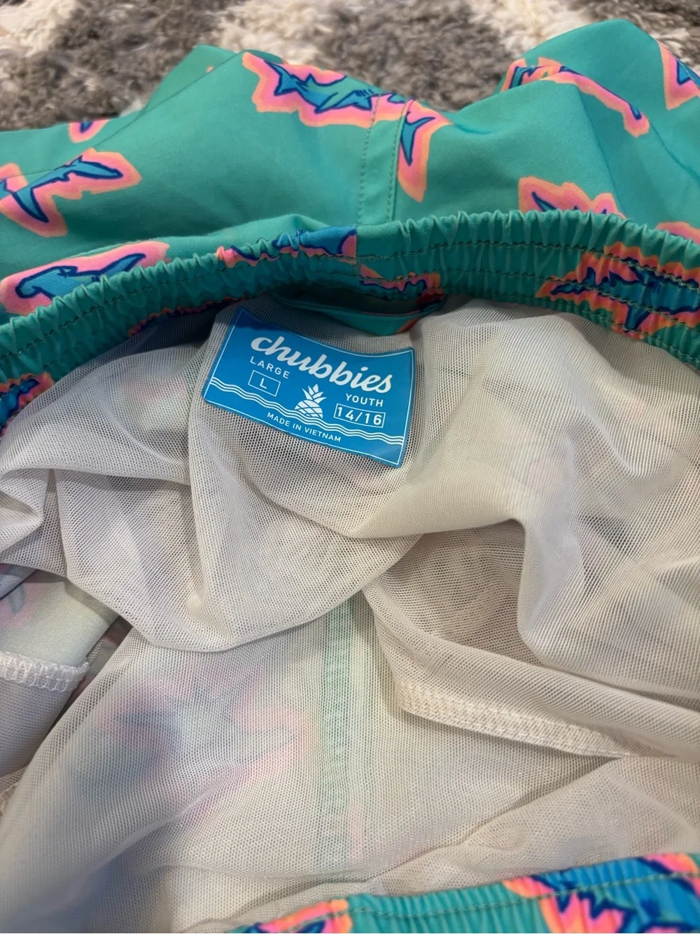 Chubbies swim shorts. Youth large 14/16. Green with sharks lined.